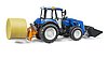 New Holland T5.120 mit Frontlader, Ladekasten, Gabeln und Rundballen