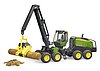John Deere 1270G harvester with one tree trunk