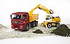 Camion à benne basculante MAN TGA avec pelleteuse Liebherr