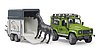 Land Rover Defender con remolque de caballos