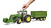 John Deere 7R 350 with frontloader and tandemaxle tipping trailer