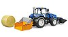 New Holland T5.120 mit Frontlader, Ladekasten, Gabeln und Rundballen