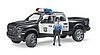 Pickup de police RAM 2500 avec policier