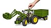 John Deere 7R 350 with frontloader and tandemaxle tipping trailer