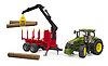 John Deere 7R con rimorchio forestale e 4 tronchi
