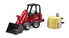 Schaffer Hoflader 2630 con forca per balle e 1 bal