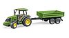 John Deere 5115 M with tipping trailer
