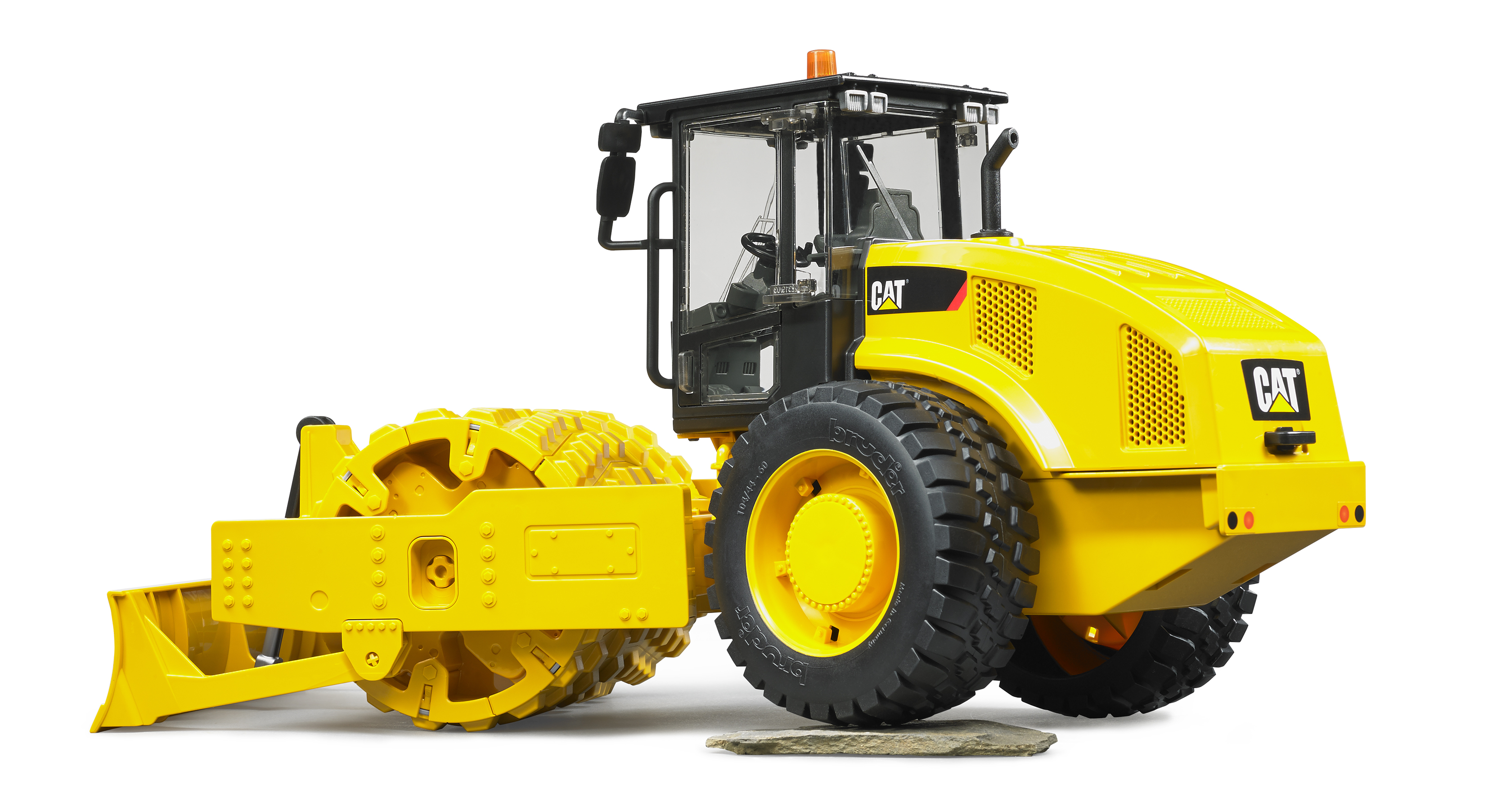 Cat® Walzenzug mit Planierschild und Stampffussbandage Cat® Walzenzug mit Planierschild und Stampffussbandage