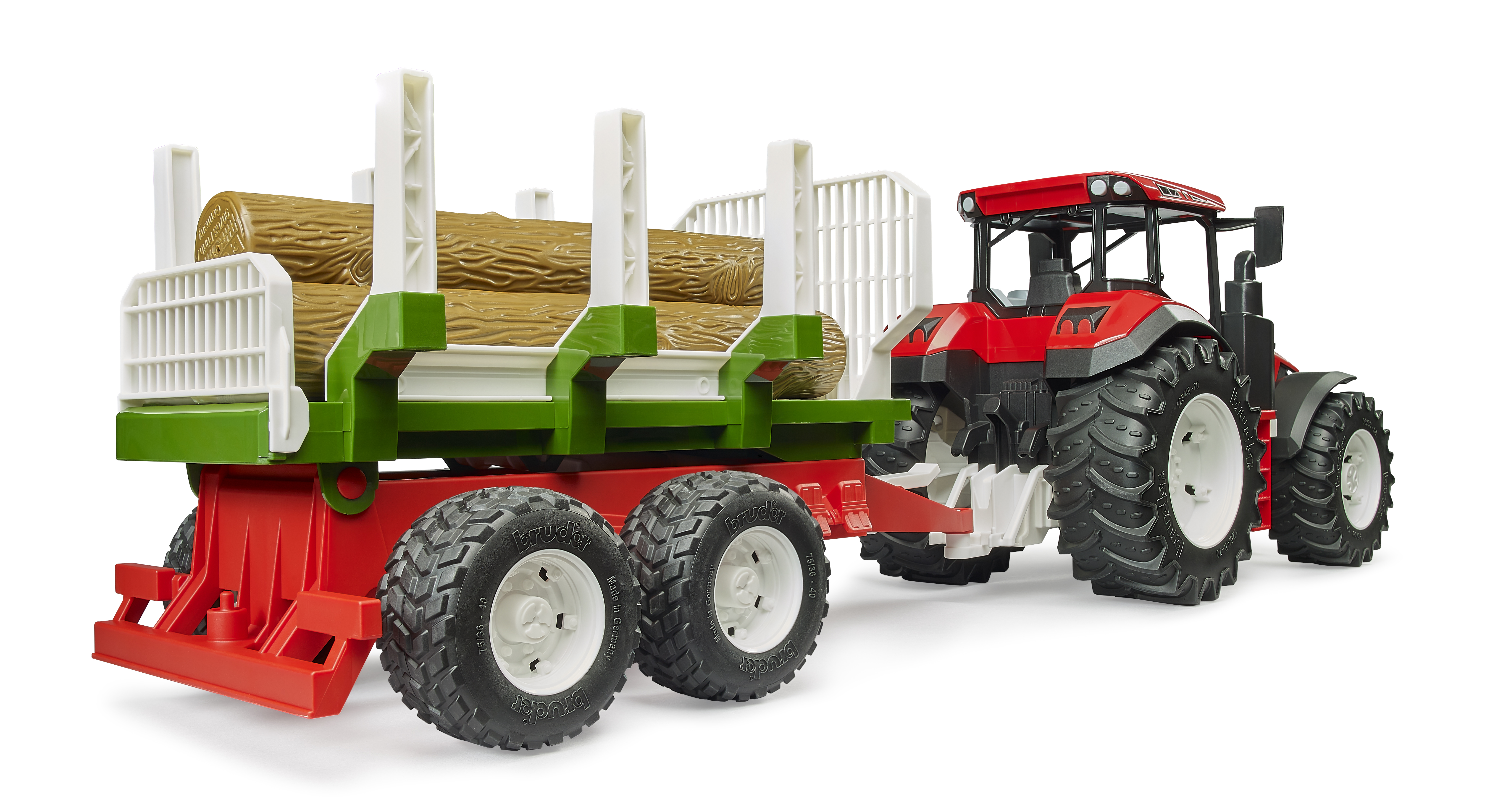 Trattore ROADMAX con rimorchio forestale e 3 tronchi