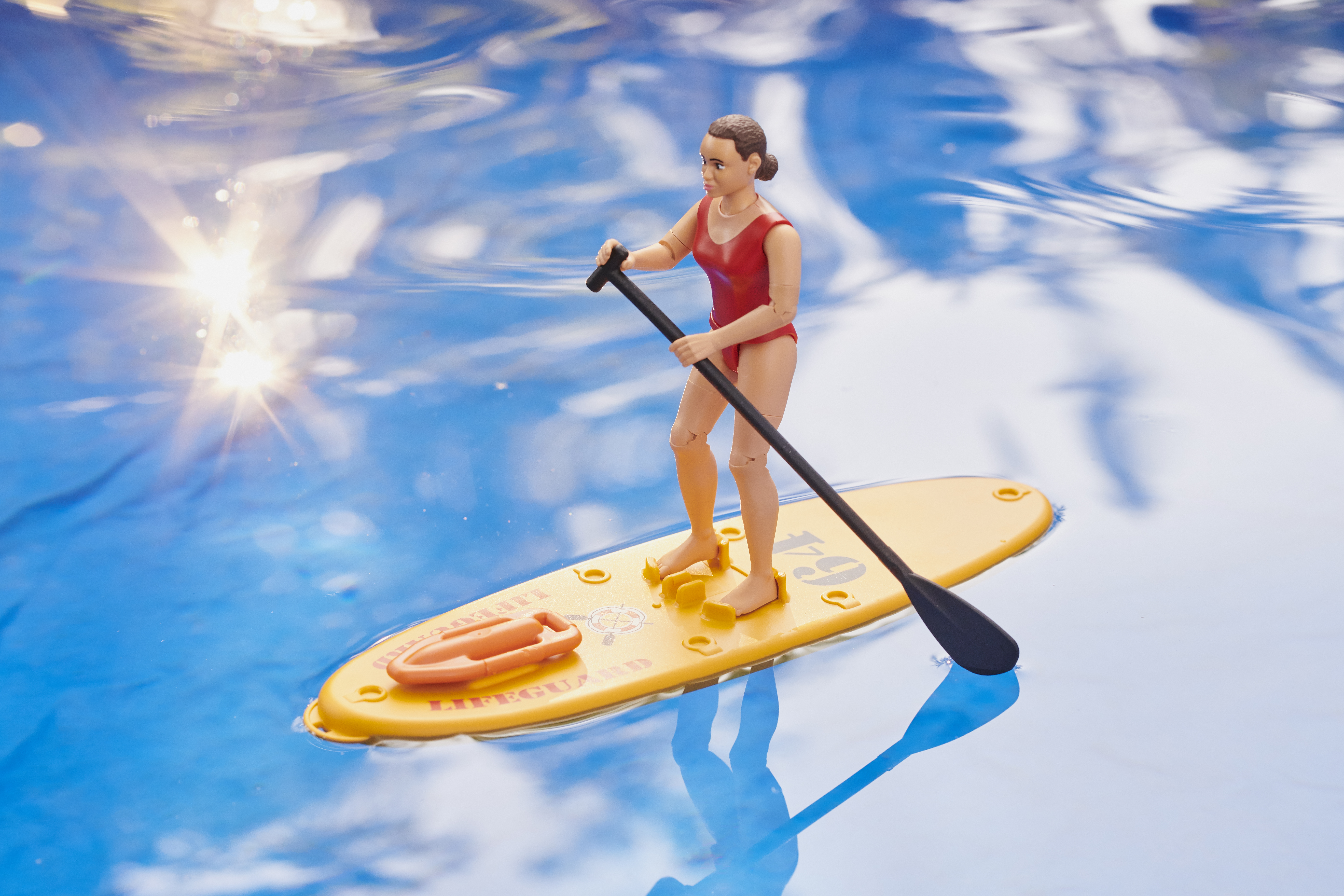 bworld Life Guard mit Stand up Paddle