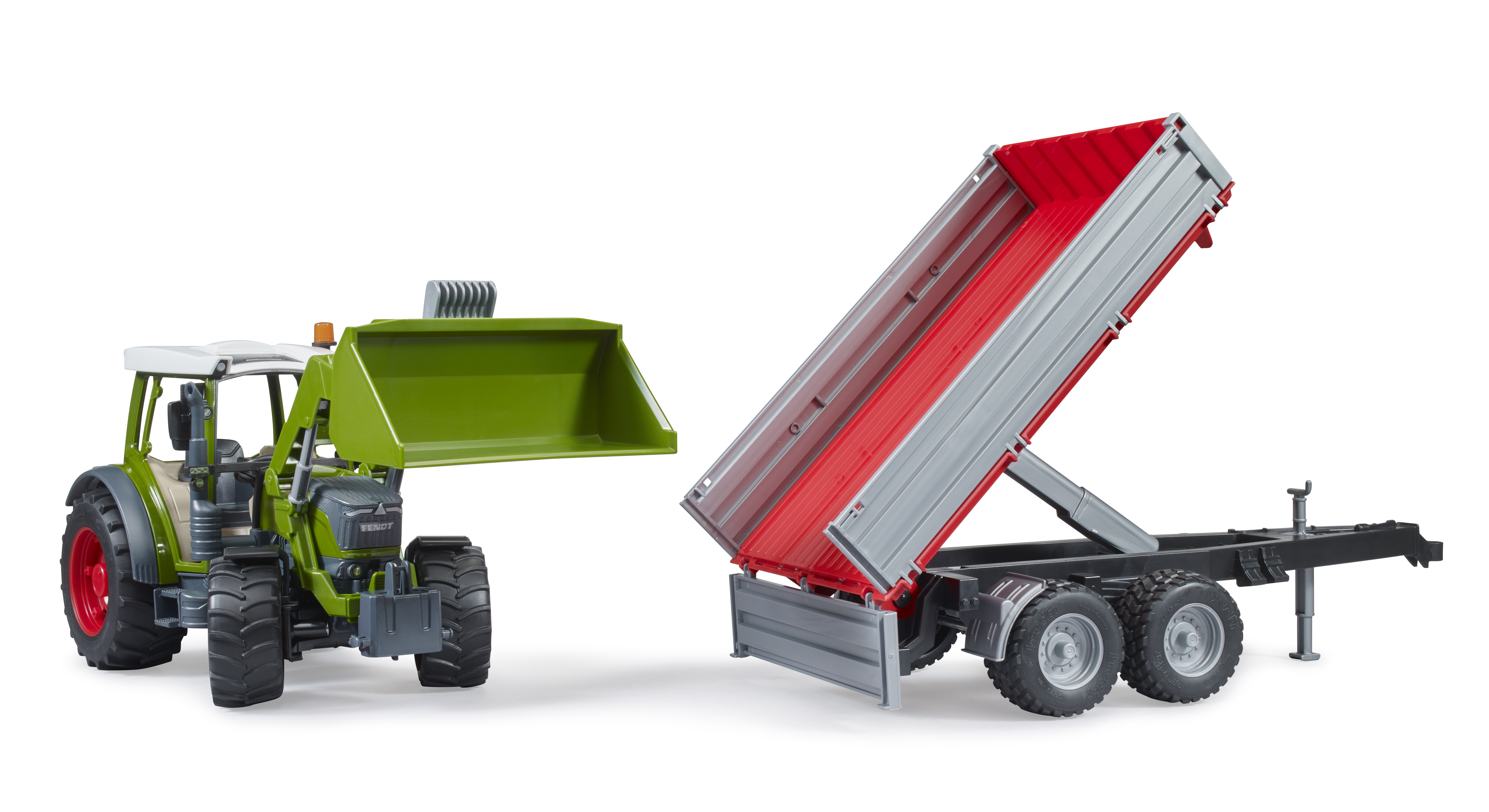 Fendt Vario 211 con cargador y remolque