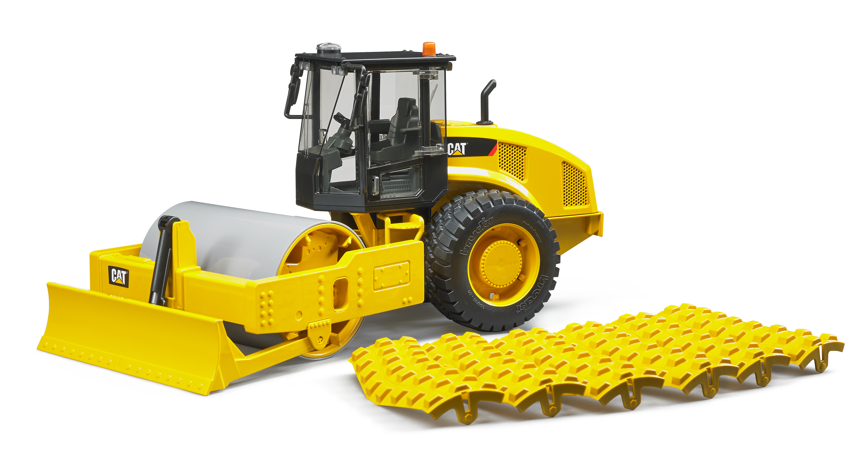 Cat® Walzenzug mit Planierschild und Stampffussbandage Cat® Walzenzug mit Planierschild und Stampffussbandage