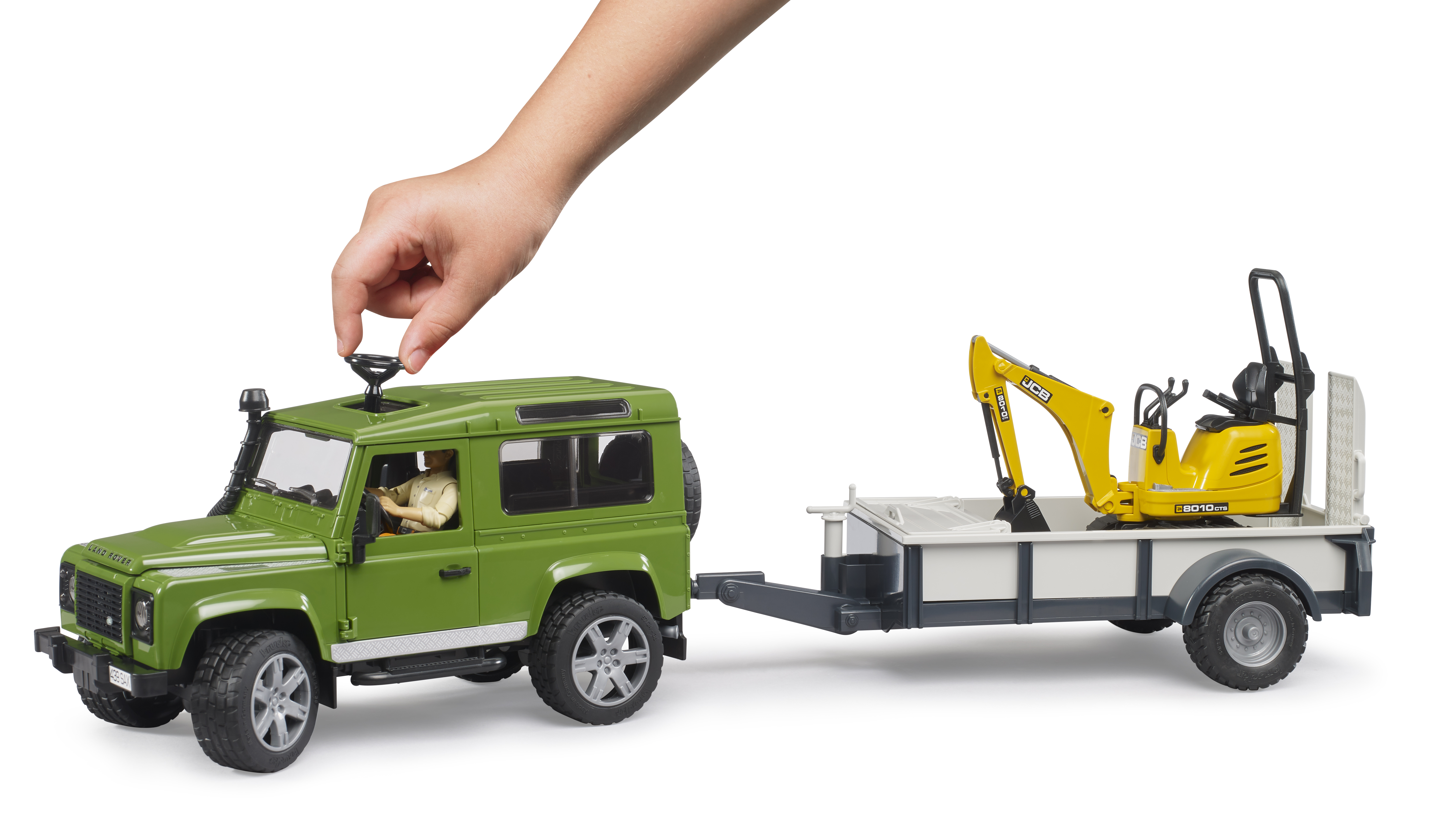 Land Rover Defender Station Wagon e micro escavatore JCB
