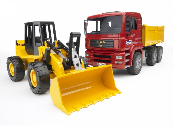 Construction truck with articulated road loader